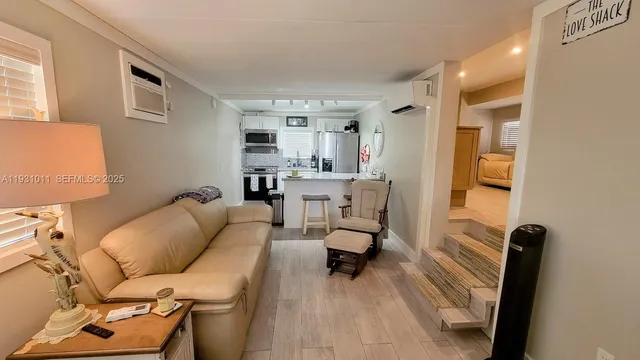 a living room with furniture and a table