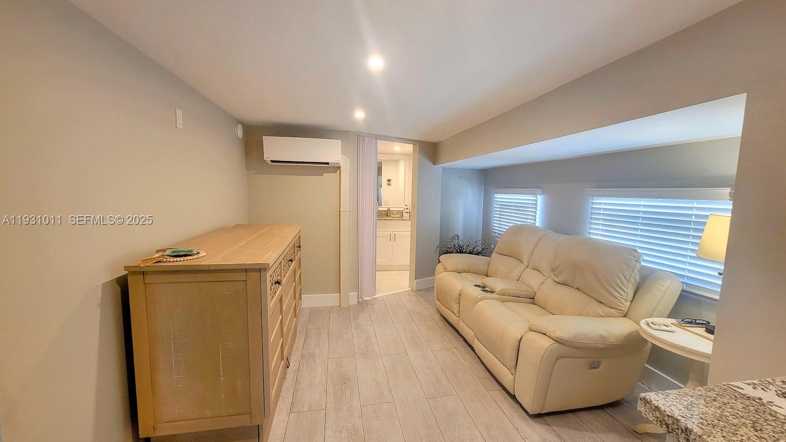 1339 Old Lakeport Road Northwest Moore Haven, FL 33471 - Photo 4 of 17 a living room with a couch and a table