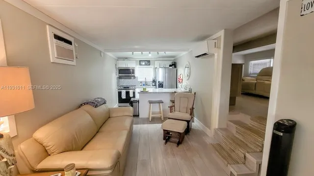 a living room with furniture and a table