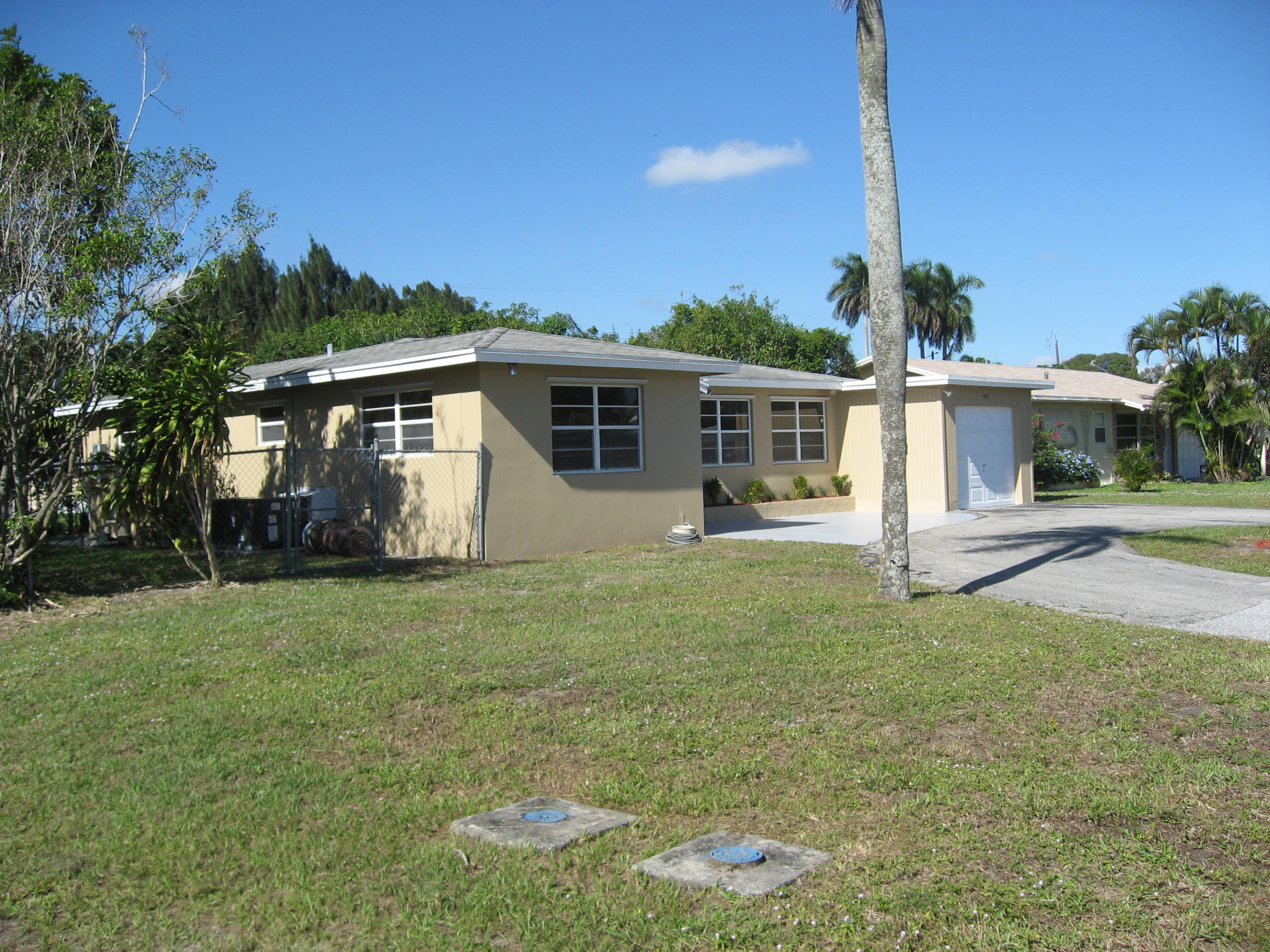 4245 Foss Road Lake Worth, FL 33461 - Photo 1 of 24 Front of Home