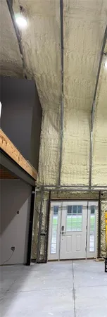 a view of a house with a garage