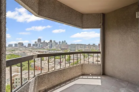 a view of city from a balcony