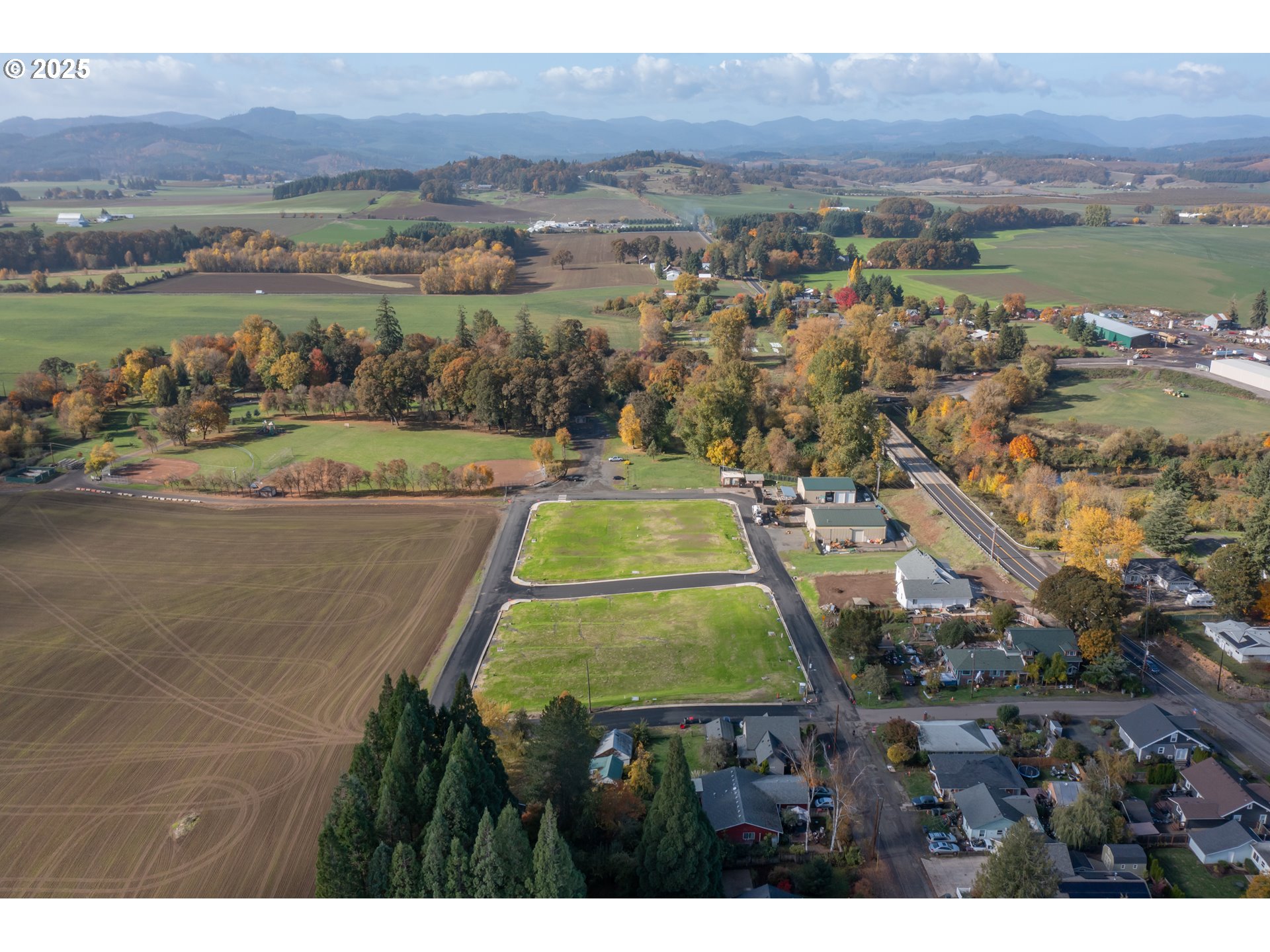 3 Block 7 Carlton, OR 97111 - Photo 16 of 43 an aerial view of a house with a lake view