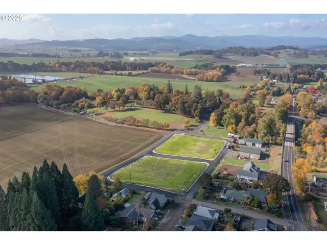 a view of an swimming pool a lake and mountain view