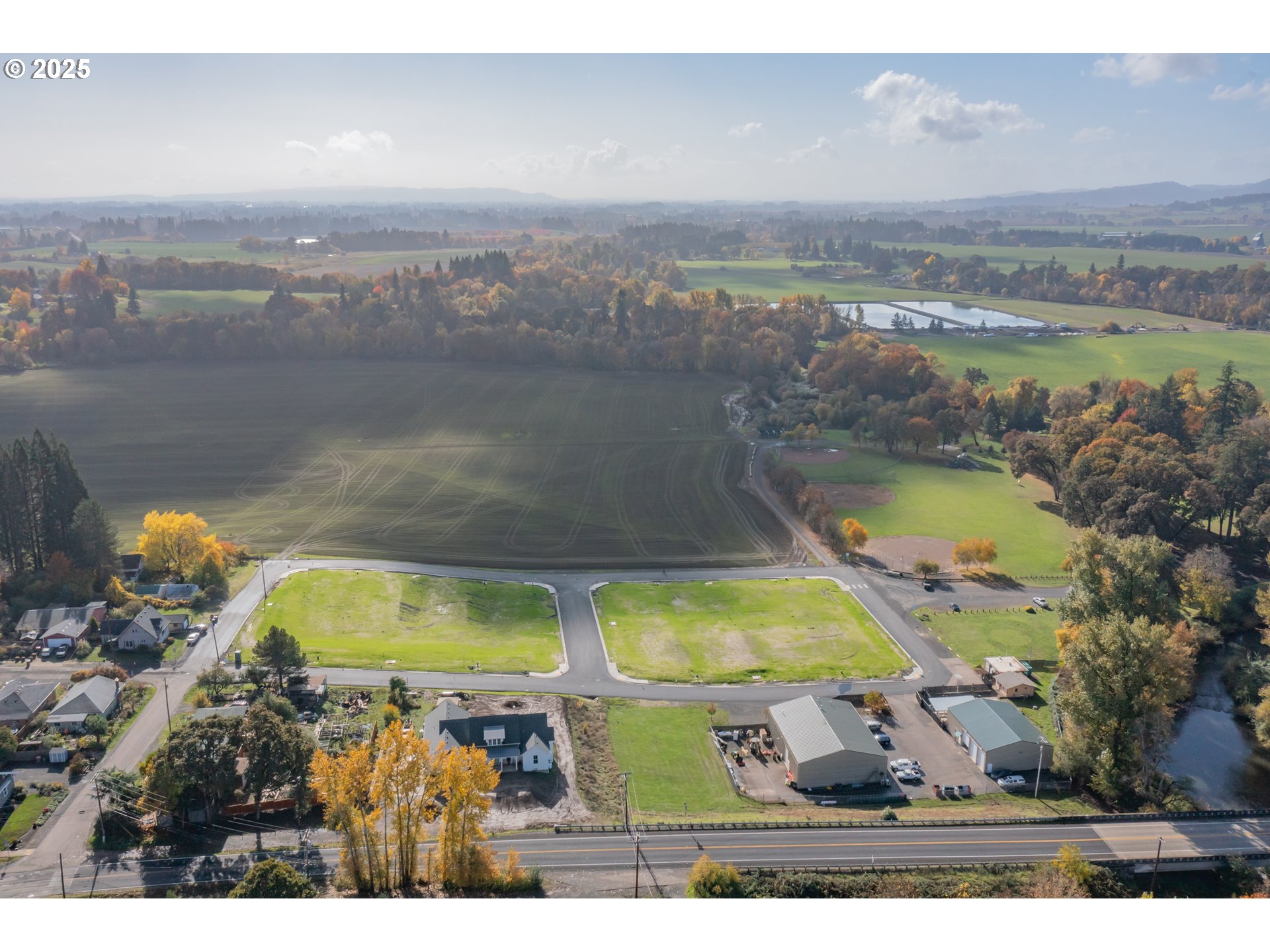 3 Block 7 Carlton, OR 97111 - Photo 20 of 43 a view of an swimming pool a lake and mountain view