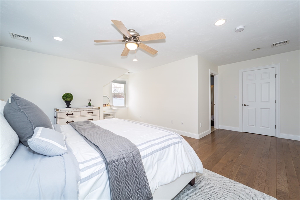 26 Wellesley Avenue, Unit B Natick, MA 01760 - Photo 17 of 34 a bedroom with a bed and window