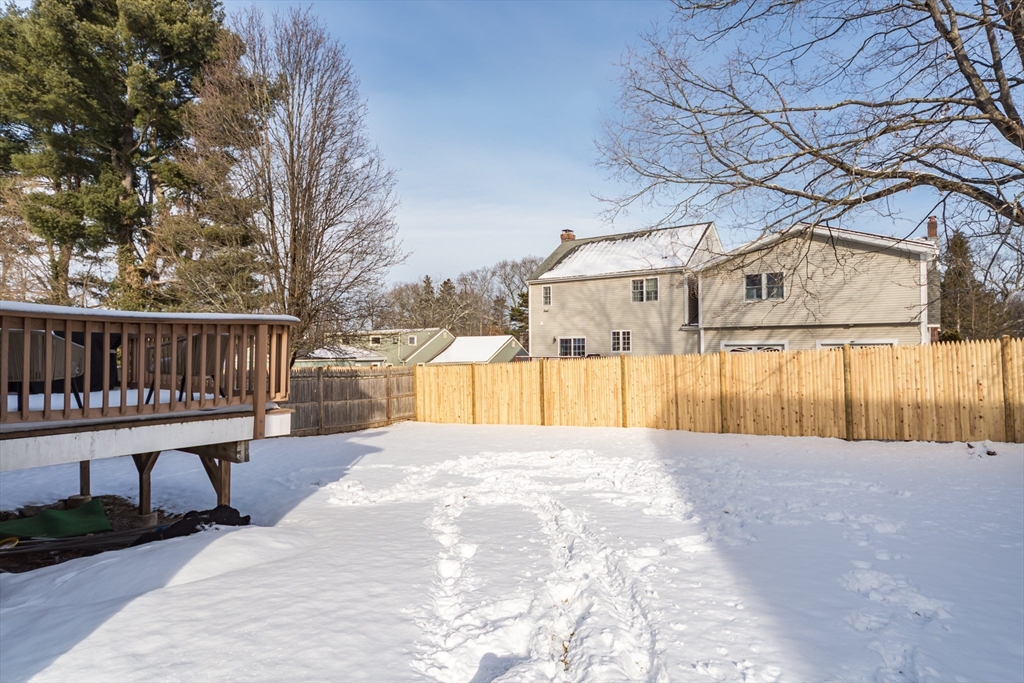 26 Wellesley Avenue, Unit B Natick, MA 01760 - Photo 32 of 34 a view of a house with a yard