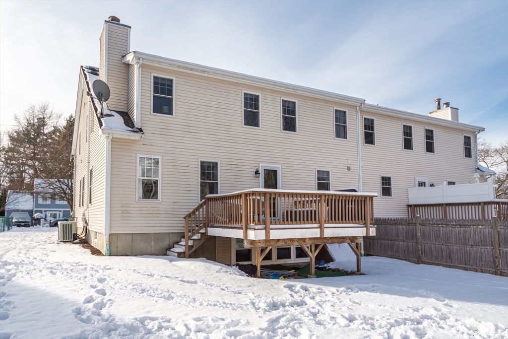 26 Wellesley Avenue, Unit B Natick, MA 01760 - Photo 33 of 34 a view of a house with wooden deck
