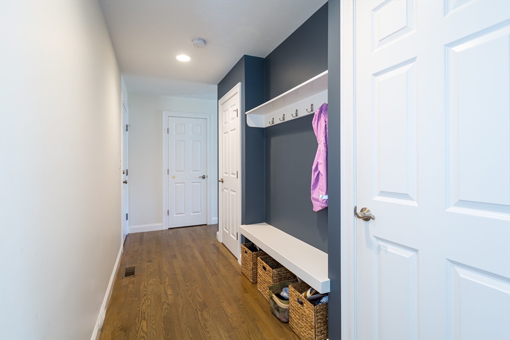 26 Wellesley Avenue, Unit B Natick, MA 01760 - Photo 4 of 34 a view of hallway with wooden floor