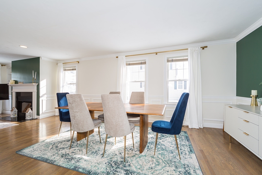 26 Wellesley Avenue, Unit B Natick, MA 01760 - Photo 5 of 34 a view of a dining room with furniture