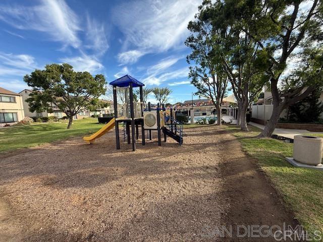 10385 Seth Way Santee, CA 92071 - Photo 28 of 33 a view of a park with swings and slides