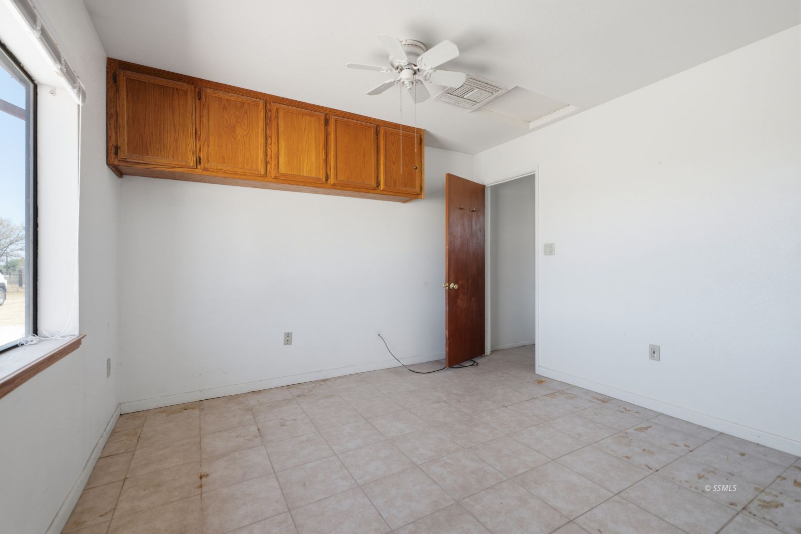 3443 3rd Street Inyokern, CA 93527 - Photo 7 of 24 a view of an empty room with a window