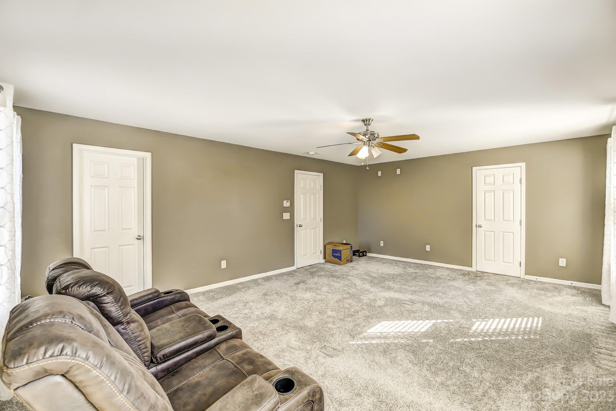 3042 Rhododendron Place Clover, SC 29710 - Photo 29 of 47 a bedroom with a bed and ceiling fan