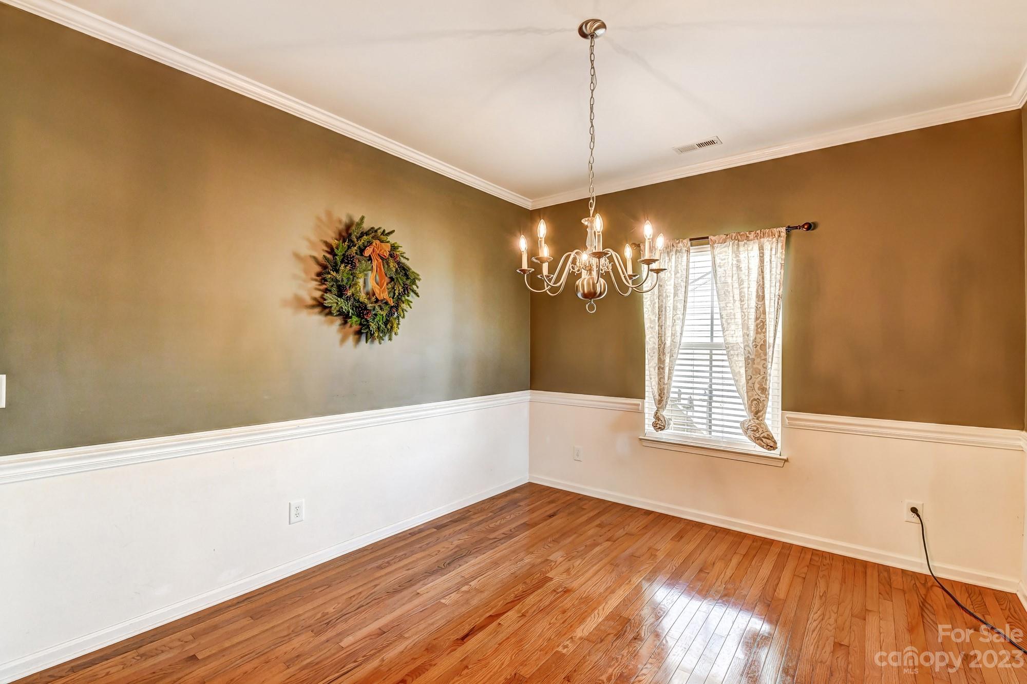 3042 Rhododendron Place Clover, SC 29710 - Photo 7 of 47 a view of a room with window and chandelier