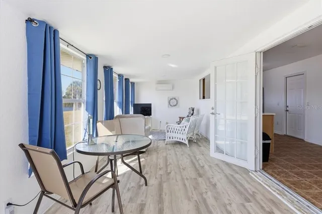 a living room with furniture and a table