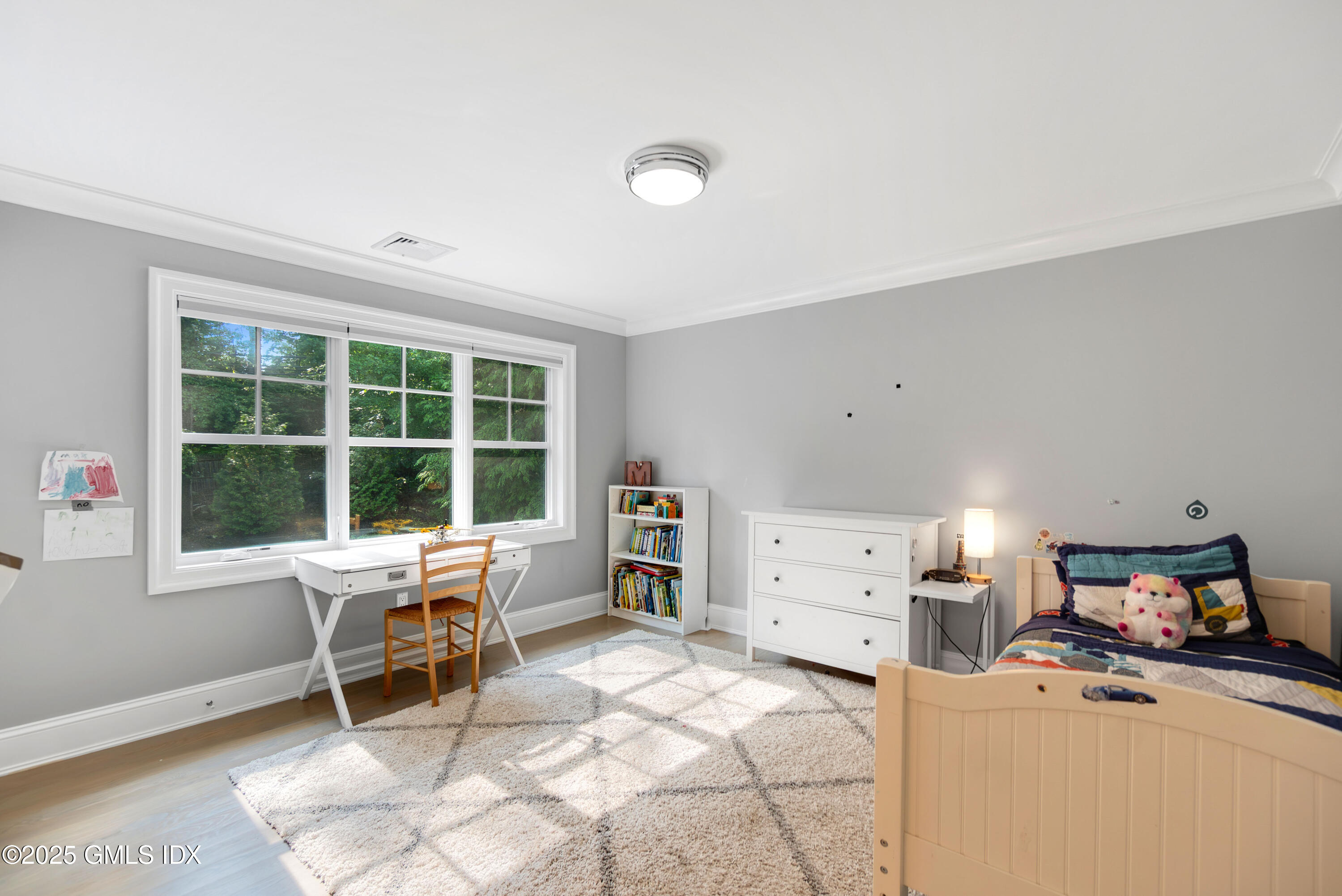 53 Long Meadow Road Riverside, CT 06878 - Photo 16 of 27 a bed room with a bed and a window