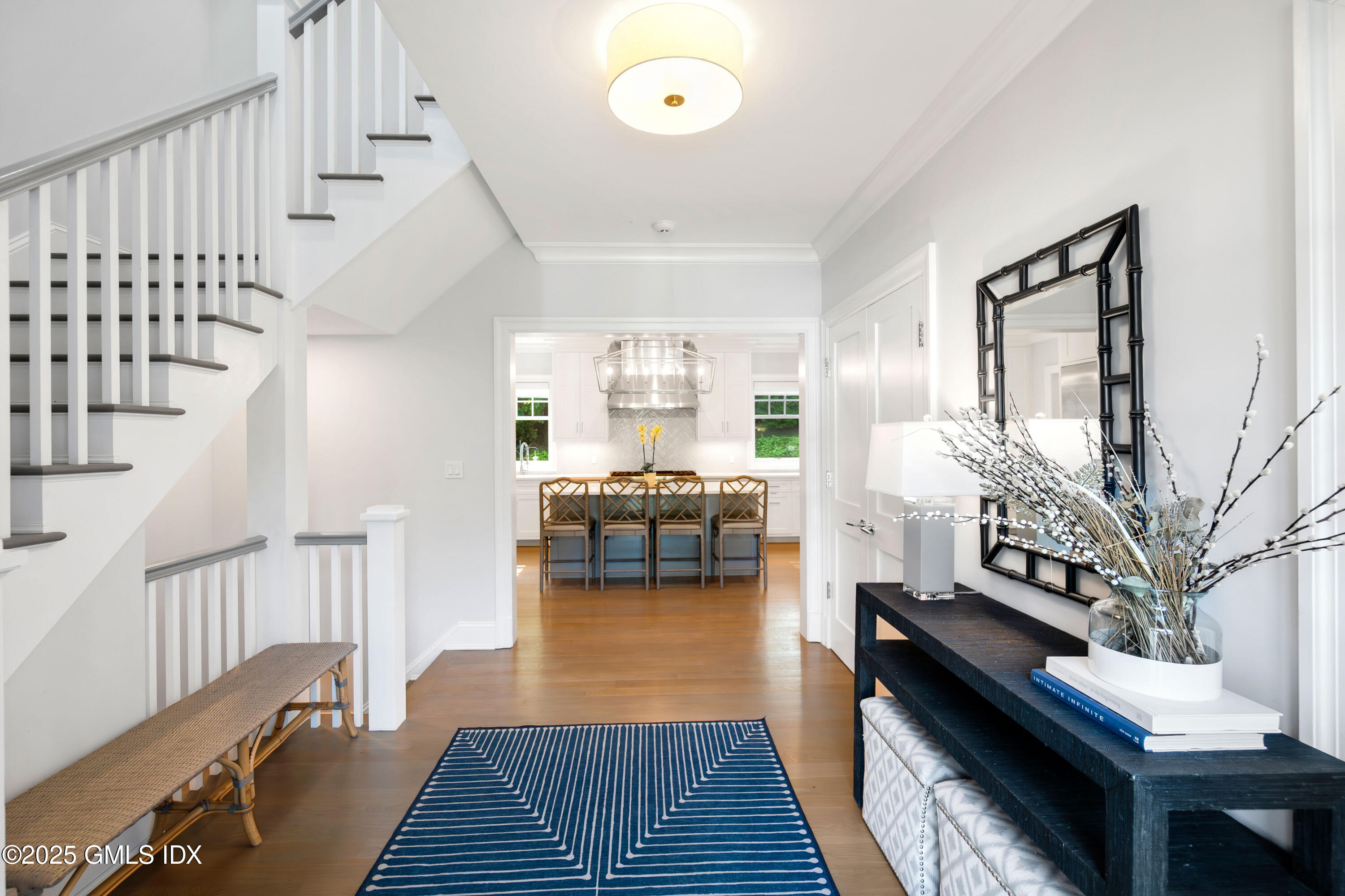53 Long Meadow Road Riverside, CT 06878 - Photo 2 of 27 a living room with furniture and a wooden floor