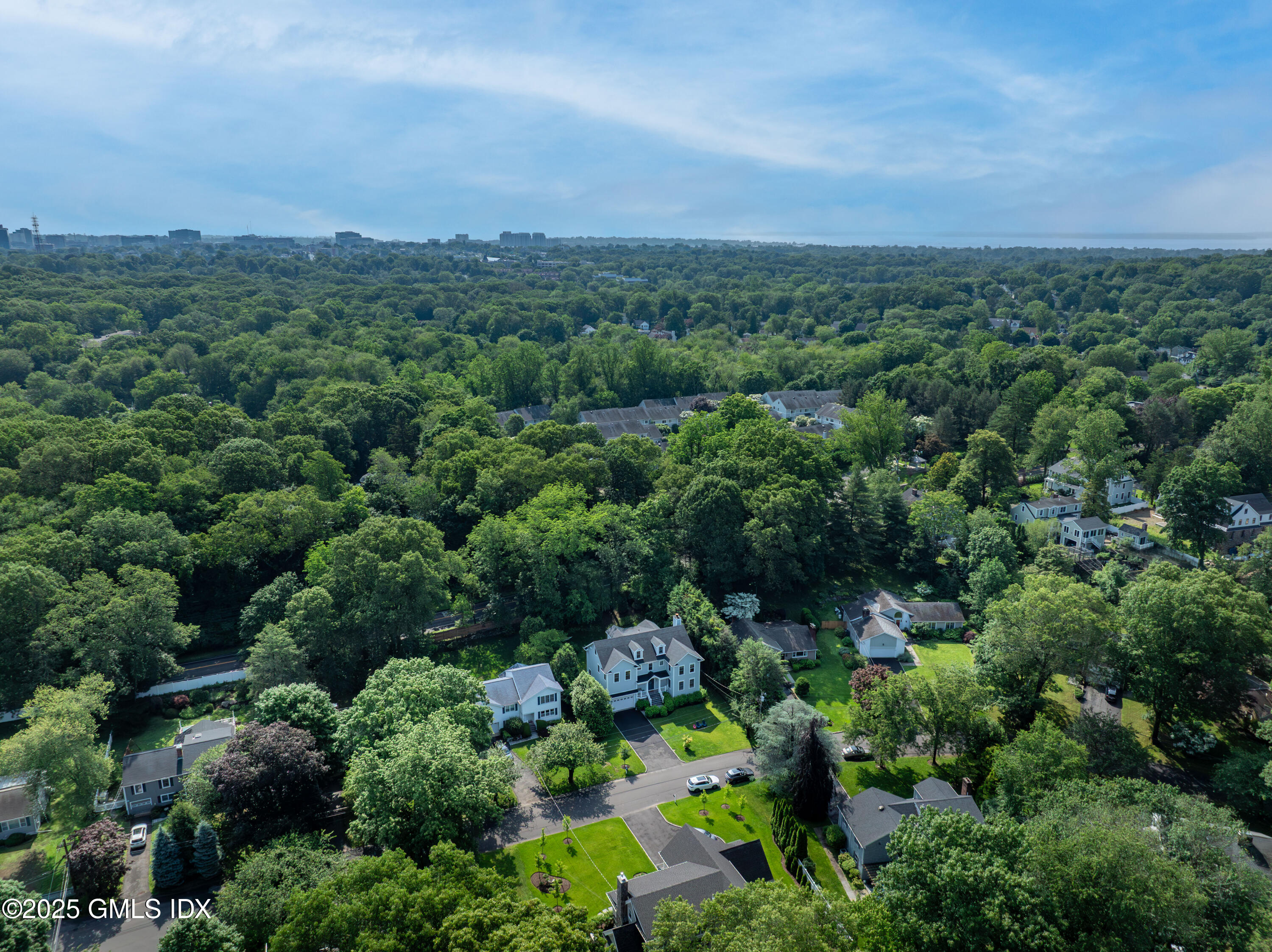 53 Long Meadow Road Riverside, CT 06878 - Photo 24 of 27 an aerial view of a house with mountain view