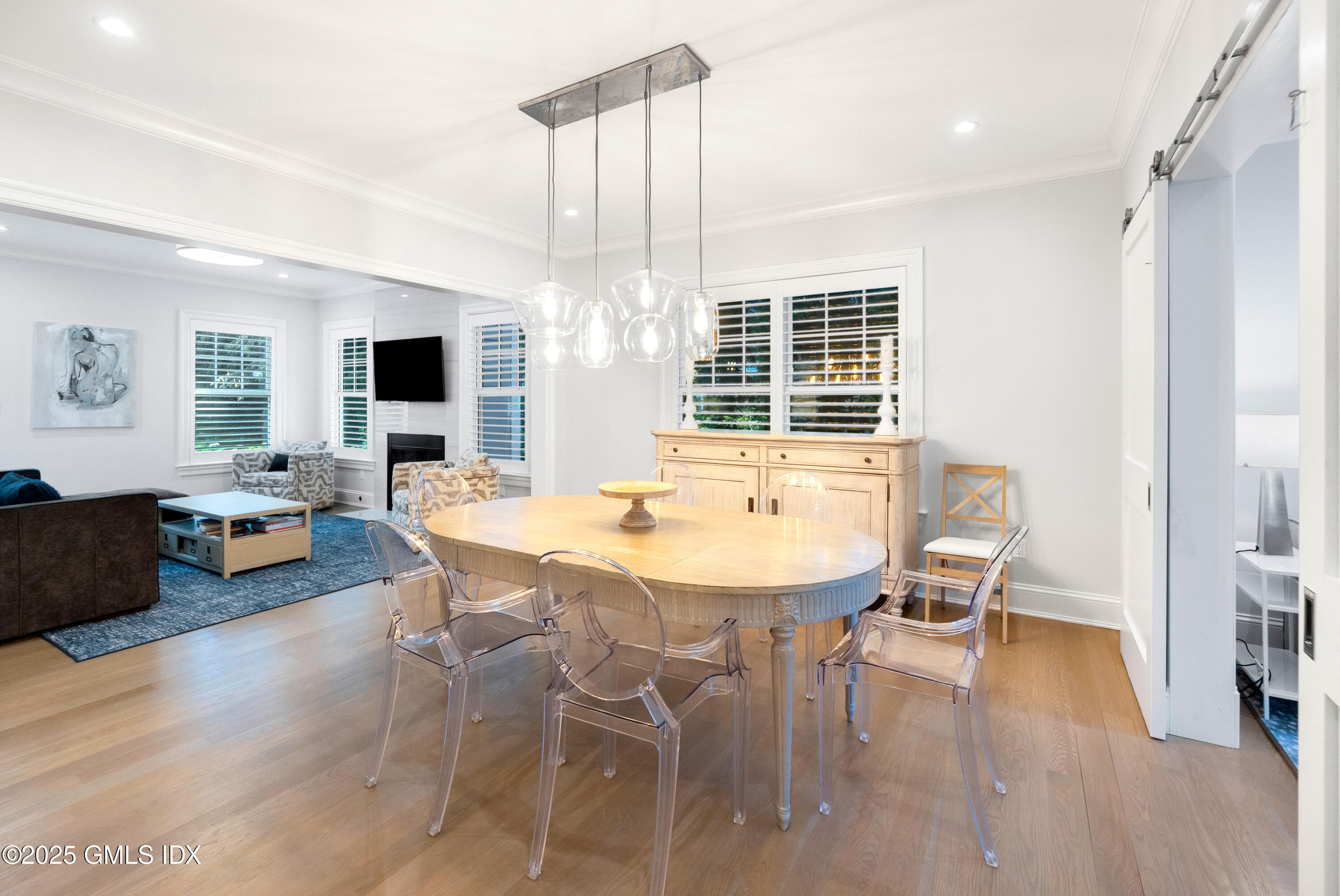 53 Long Meadow Road Riverside, CT 06878 - Photo 8 of 27 a view of a dining room with furniture window and wooden floor
