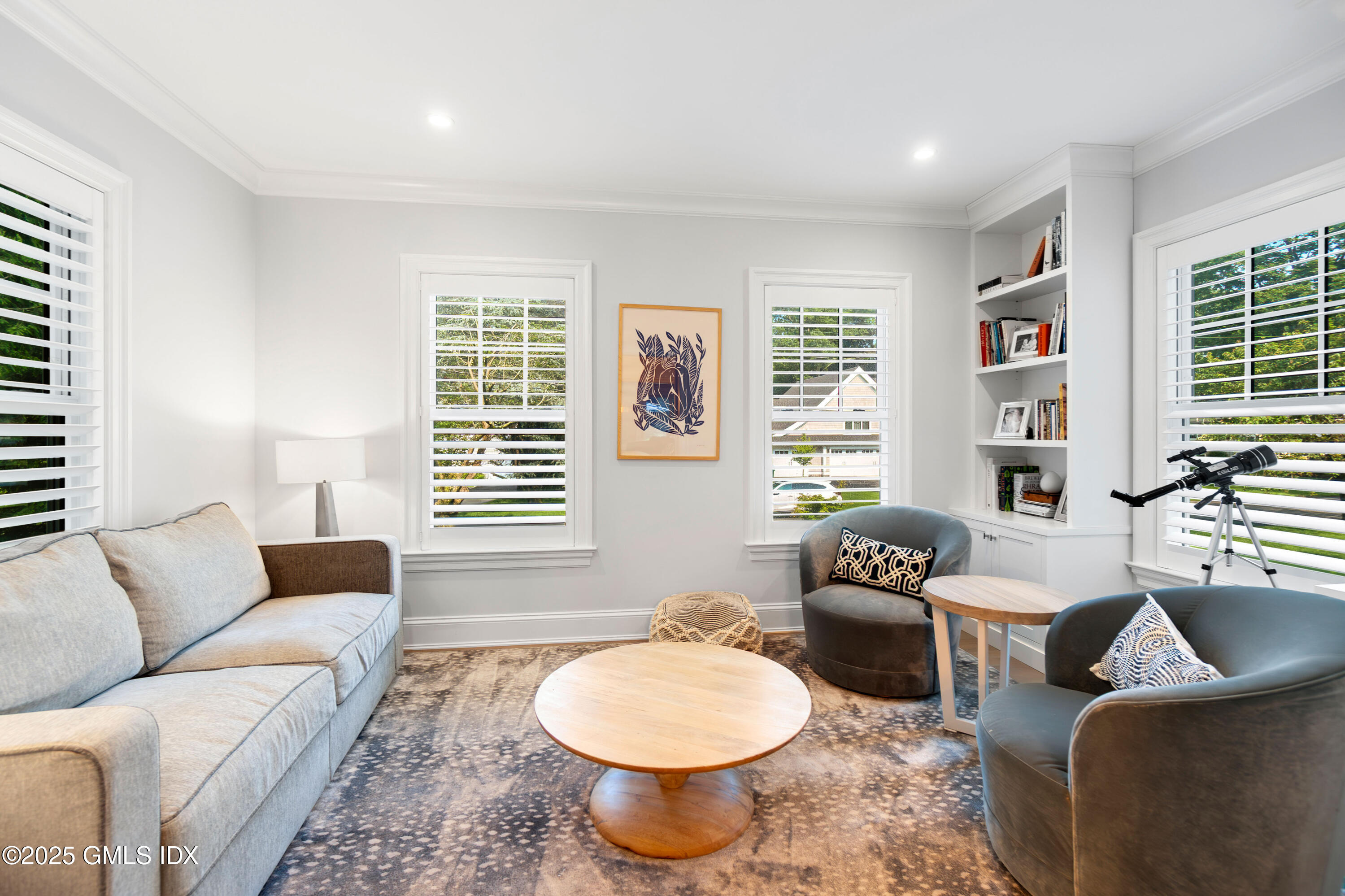 53 Long Meadow Road Riverside, CT 06878 - Photo 10 of 27 a living room with furniture and a window