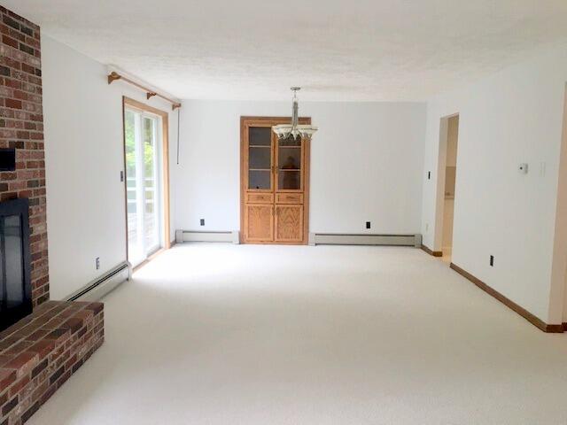 2003 Belgrade Road Sidney, ME 04330 - Photo 10 of 37 Large living room with fireplace