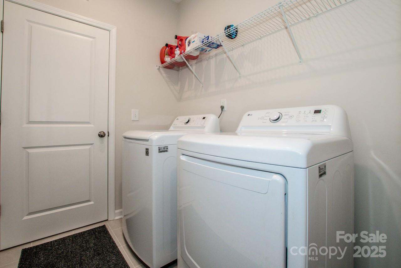 1270 Brawley School Road, Unit F Mooresville, NC 28117 - Photo 27 of 47 a utility room with dryer and washer