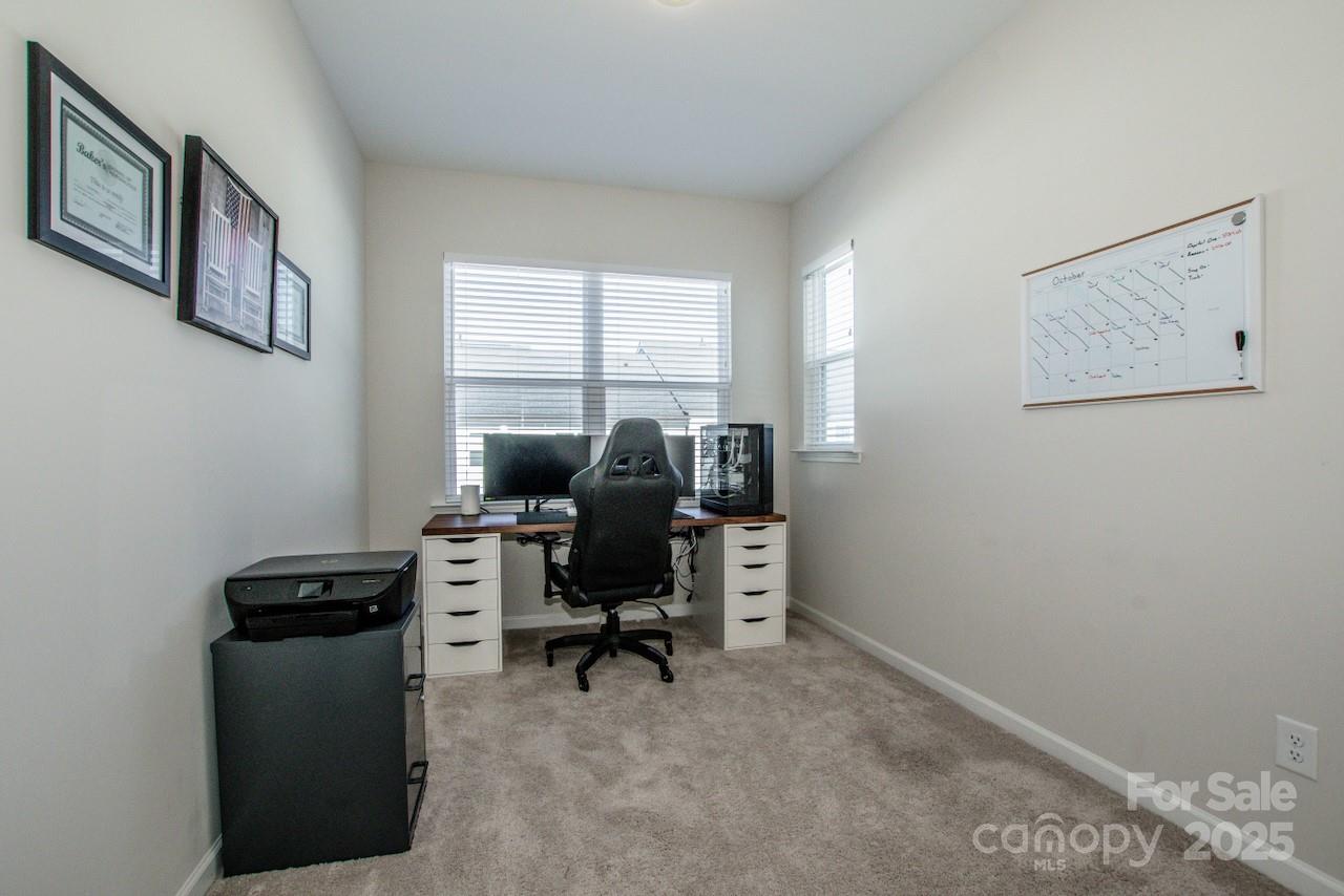 1270 Brawley School Road, Unit F Mooresville, NC 28117 - Photo 40 of 47 a view of a workspace with furniture and a window