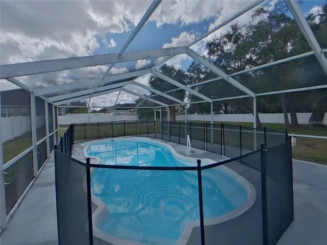 a house with trees in the background