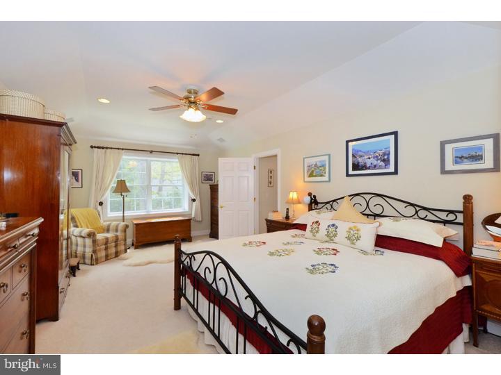 658 Knox Road Wayne, PA 19087 - Photo 11 of 25 a bed room with a bed and a table