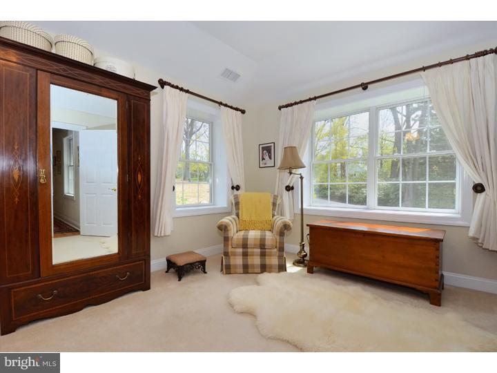 658 Knox Road Wayne, PA 19087 - Photo 12 of 25 a living room with furniture and a large window
