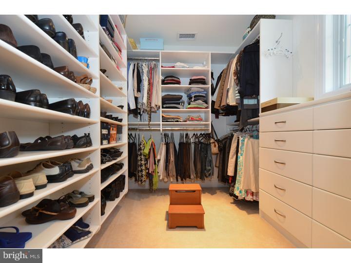 658 Knox Road Wayne, PA 19087 - Photo 14 of 25 a view of walk in closet with clothes and shoes
