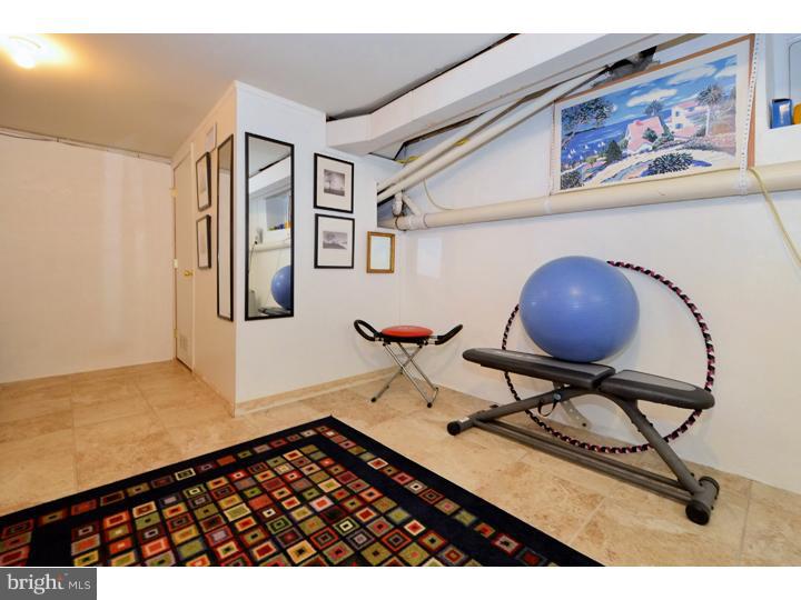 658 Knox Road Wayne, PA 19087 - Photo 20 of 25 a view of workspace with painting on the wall