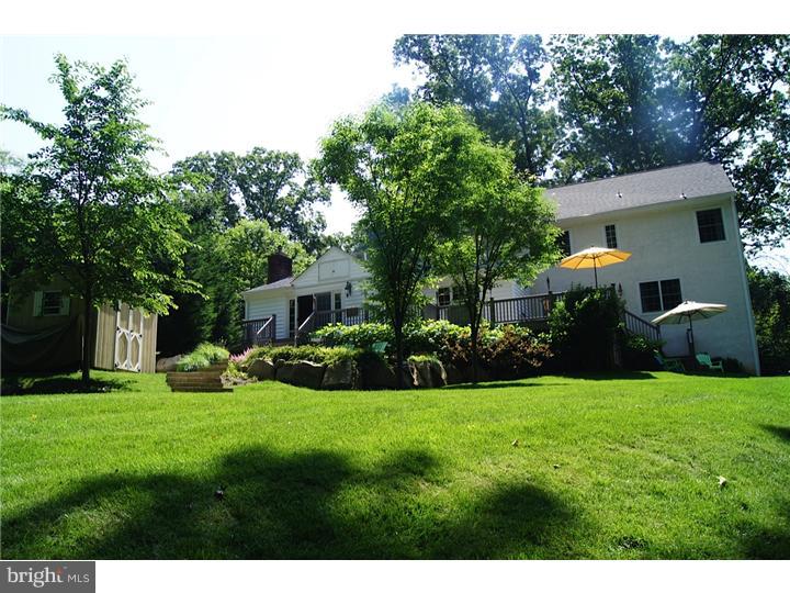 658 Knox Road Wayne, PA 19087 - Photo 22 of 25 a view of a house with a yard and sitting area