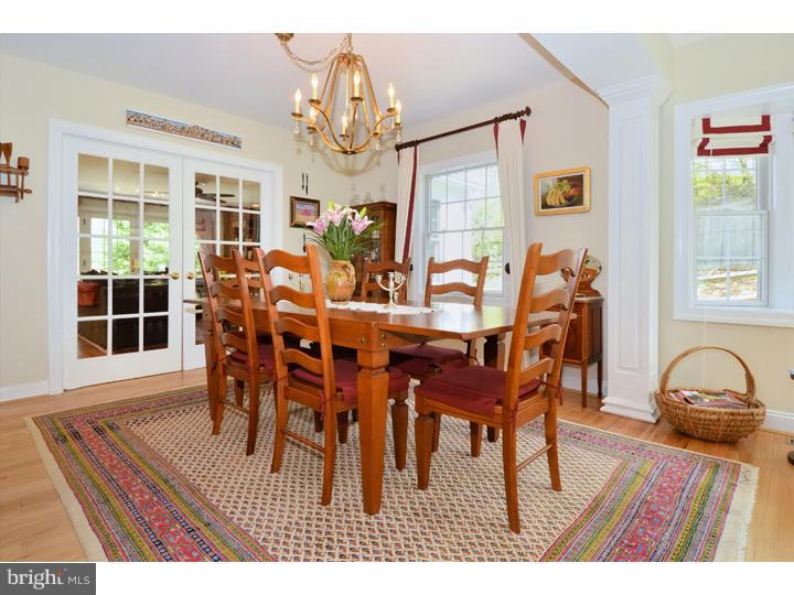 658 Knox Road Wayne, PA 19087 - Photo 5 of 25 a view of a dining room with furniture window and wooden floor