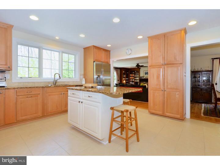 658 Knox Road Wayne, PA 19087 - Photo 7 of 25 a kitchen with counter top space cabinets and stainless steel appliances