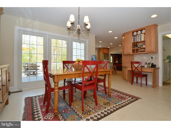 658 Knox Road Wayne, PA 19087 - Photo 8 of 25 a view of a dining room with furniture and chandelier