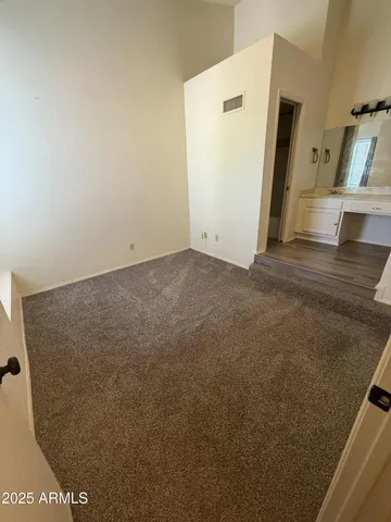 an empty room with a fireplace