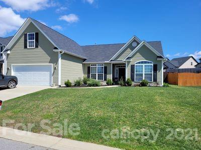 96 Catawba River Road Fletcher, NC 28732 - Photo 1 of 20 a front view of a house with a yard