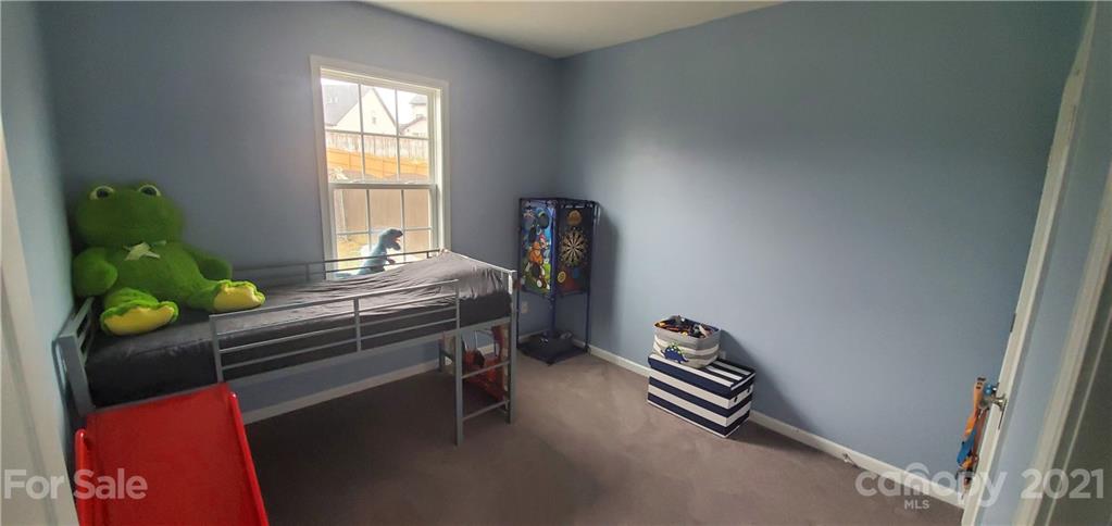 96 Catawba River Road Fletcher, NC 28732 - Photo 14 of 20 a room with a bed and a window