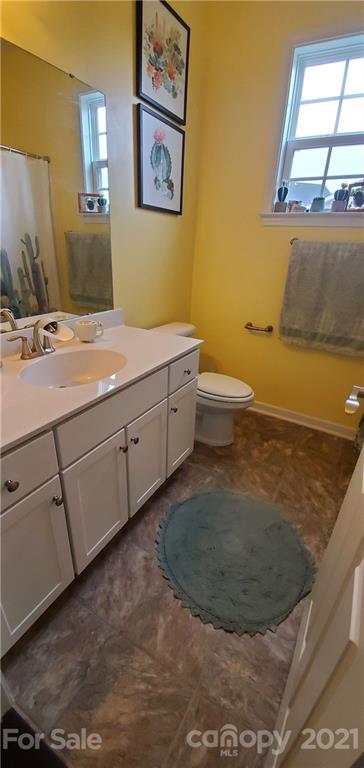 96 Catawba River Road Fletcher, NC 28732 - Photo 16 of 20 a bathroom with a granite countertop sink and a mirror