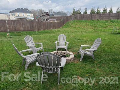 96 Catawba River Road Fletcher, NC 28732 - Photo 20 of 20 a view of a chairs in backyard of the house