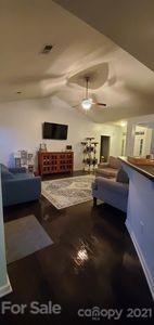 96 Catawba River Road Fletcher, NC 28732 - Photo 6 of 20 a living room with furniture and a flat screen tv