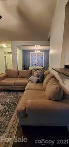 96 Catawba River Road Fletcher, NC 28732 - Photo 7 of 20 a living room with furniture and a fireplace