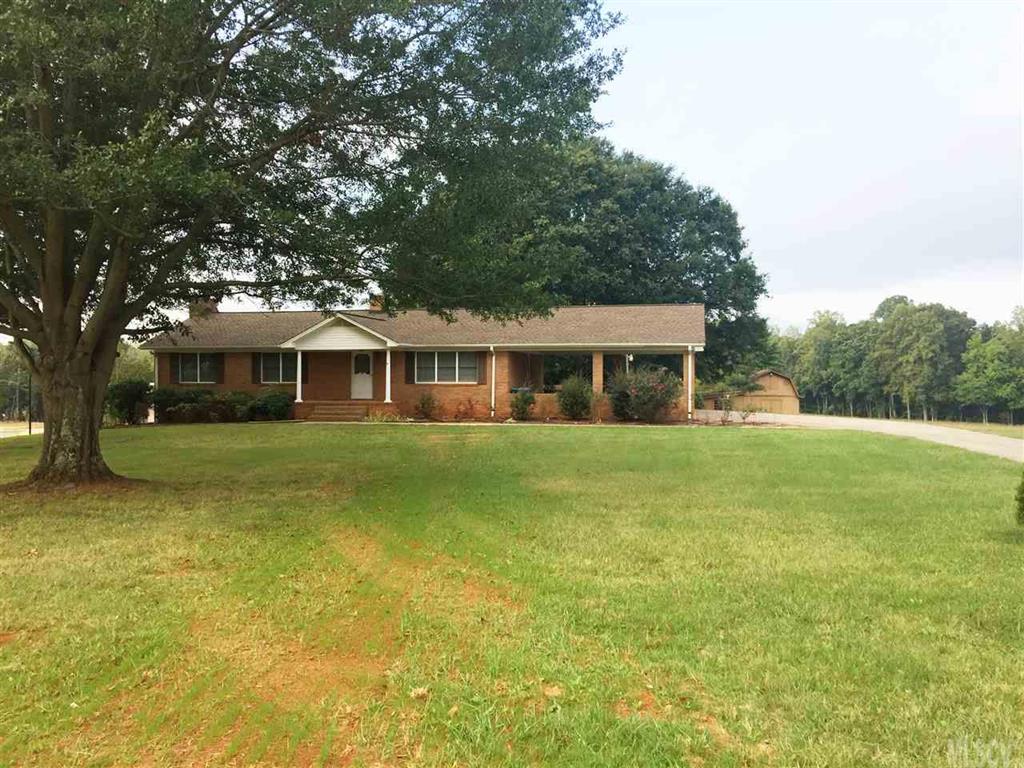 2187 Startown Road Newton, NC 28658 - Photo 1 of 21 a front view of house with yard and trees