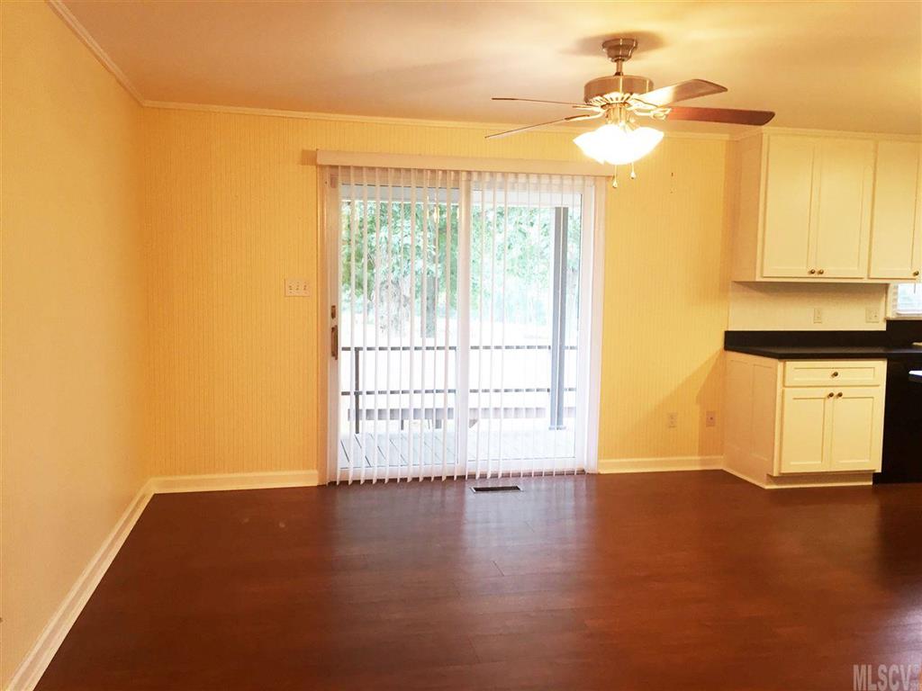 2187 Startown Road Newton, NC 28658 - Photo 18 of 21 a view of a room with wooden floor and a window