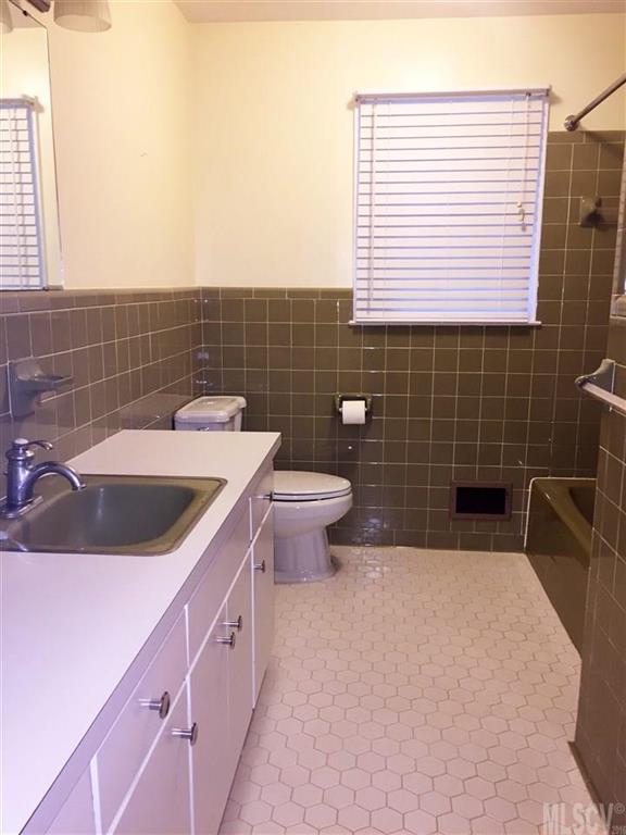 2187 Startown Road Newton, NC 28658 - Photo 20 of 21 a bathroom with a sink a toilet and mirror