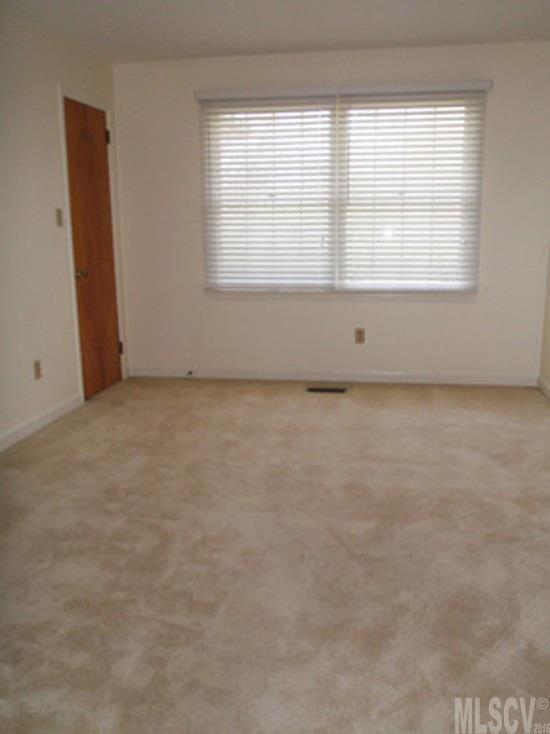 2187 Startown Road Newton, NC 28658 - Photo 5 of 21 an empty room with a window