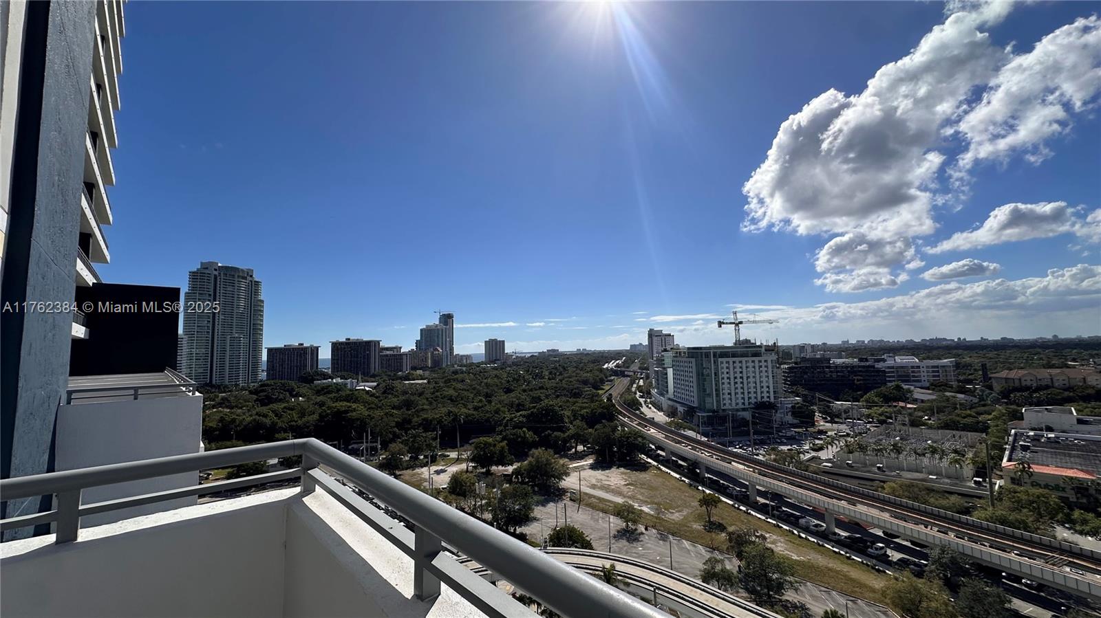 60 Southwest 13th Street, Unit 1115 Miami, FL 33130 - Photo 6 of 11 a city view from a balcony