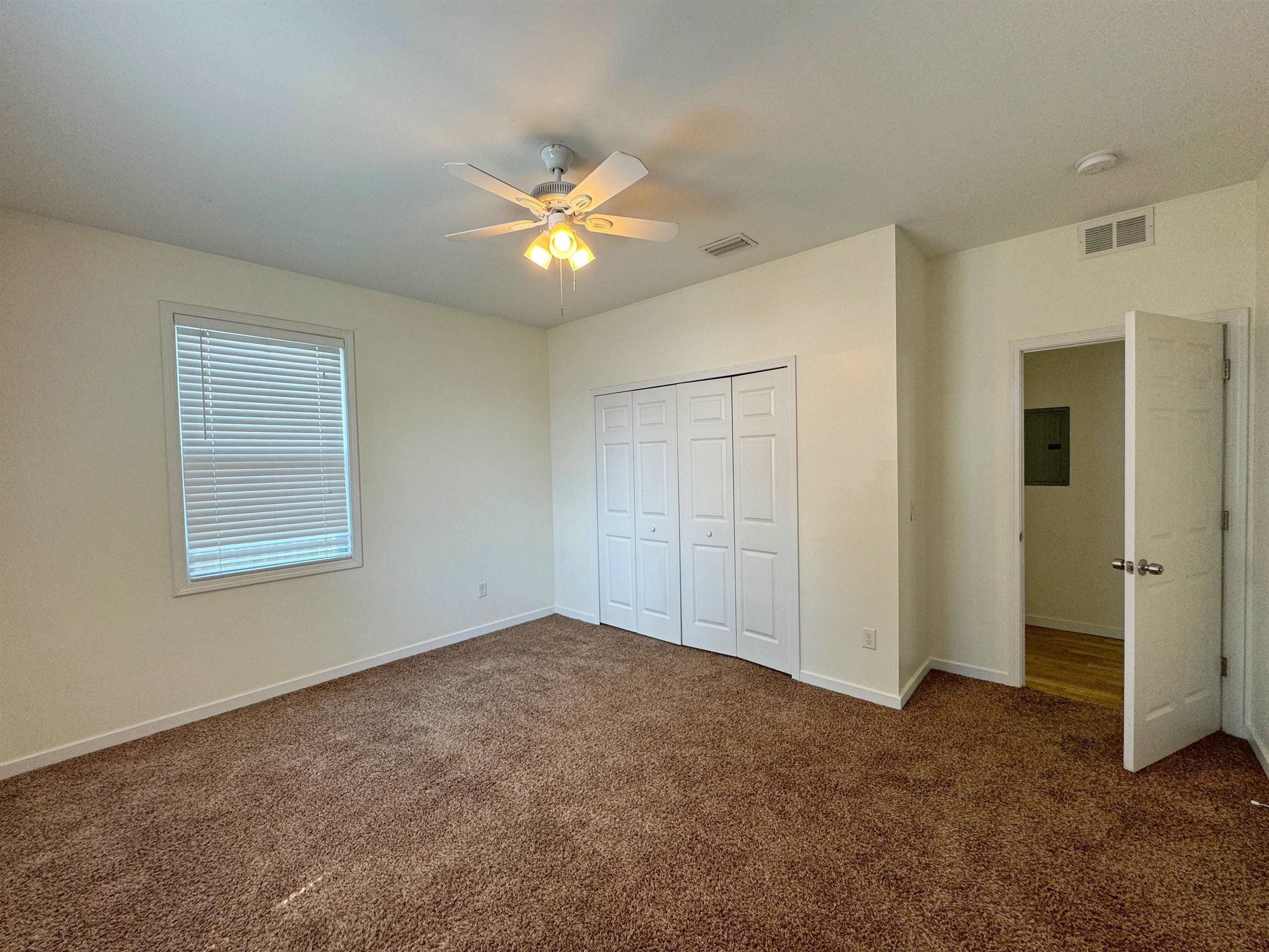 38 Weeden Street, Unit A St. Augustine, FL 32084 - Photo 27 of 29 a view of an empty room with a window