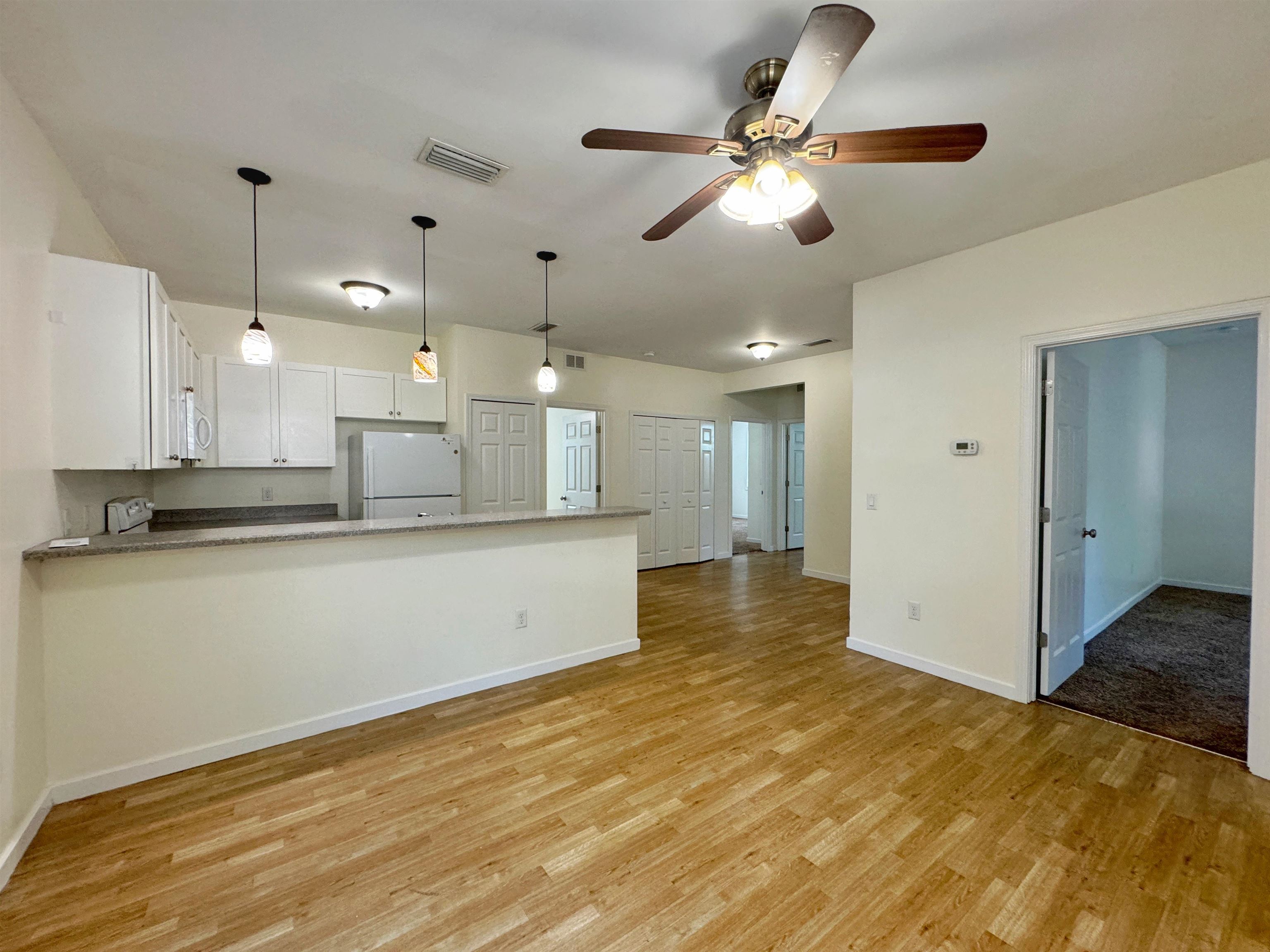 38 Weeden Street, Unit A St. Augustine, FL 32084 - Photo 5 of 29 a view of kitchen with wooden floor